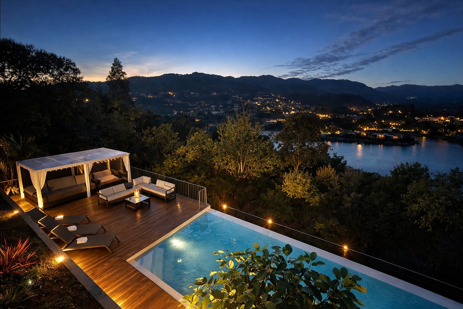 Piscine à débordement d'Alynes au crépuscule, face au lac et aux montagnes du Gerês